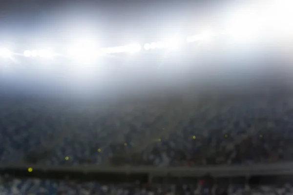 Multitud borrosa de espectadores en un estadio tribuna en un evento deportivo — Foto de Stock