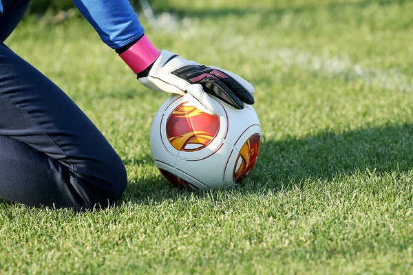 Greek Superleague Brazuca (Mundial) balls on the goalkeeper's ha — Stock Photo, Image