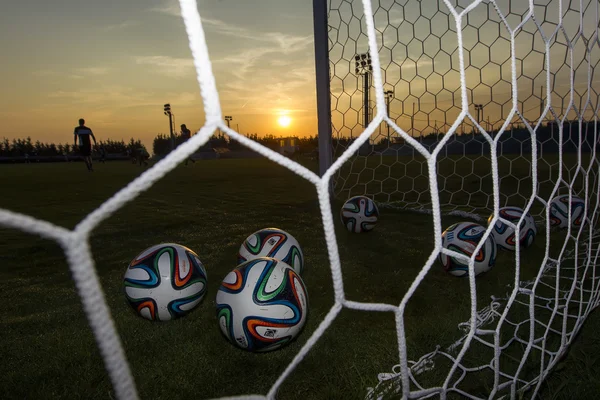 Greek Superleague Brazuca (Mundial) balls in net during Paok tr — Stock Photo, Image