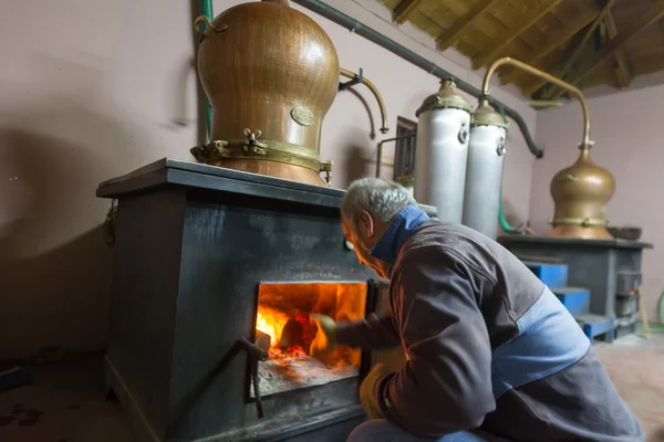 Traditional distillation of alcohol and production of homemade t — Stock Photo, Image