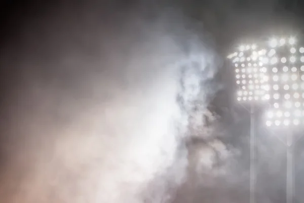 Stadium lights and smoke — Stock Photo, Image