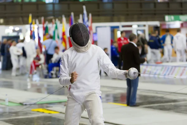 Young athletes competing during the World Youth Fencing Champion — Stock Photo, Image