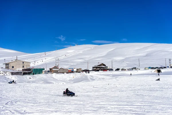 Visitors enjoy the snow on snowmobiles in Falakro ski center, Gr — Stock Photo, Image