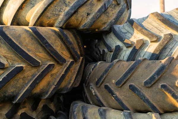 Numerous tires stacked on top of each other — Stock Photo, Image