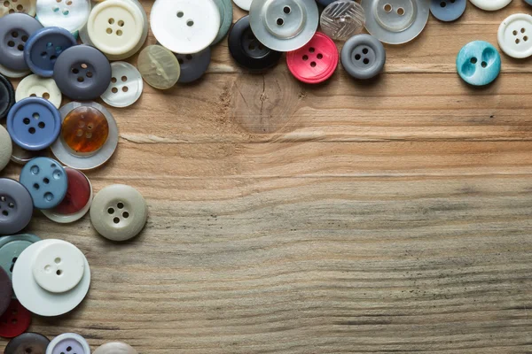 Colored buttons on wooden board, Colorful buttons, on old wooden — Stock Image Colored buttons on wooden board, Colorful buttons, on old wooden Stock Image