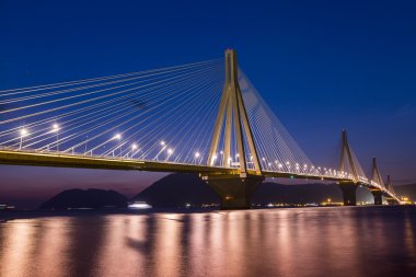 View of the bridge Rio-Antirio in Greece, at night. clipart