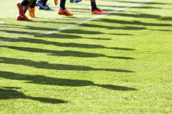 The feet of the players of Paok with their shadows during team p — Stock Photo, Image