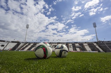 Balls of Paok team on the field of the stadium during team pract