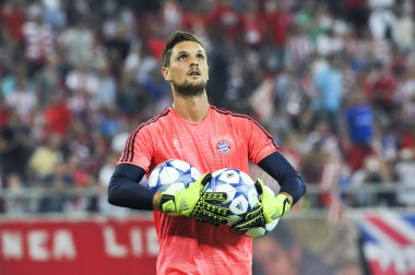 Goalkeeper Sven Ulreich holding balls during the UEFA Champions
