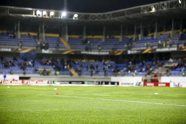 Imagem turva de um campo de futebol, usar para fundo . — Fotografia de Stock