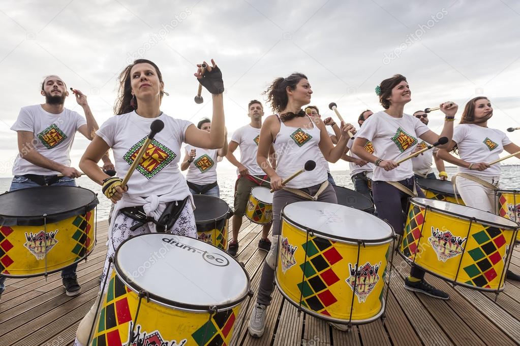 Drummers and musicians during  outdoor fashion show with clothin