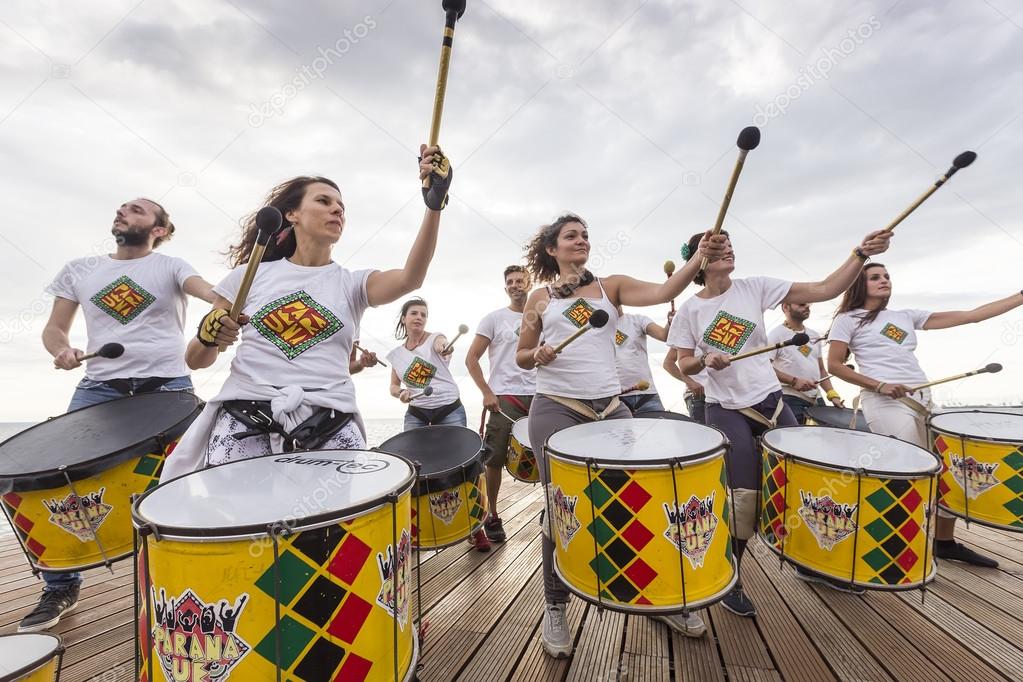 Drummers and musicians during  outdoor fashion show with clothin