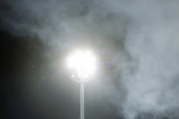 Stadium lights and smoke — Stock Photo, Image