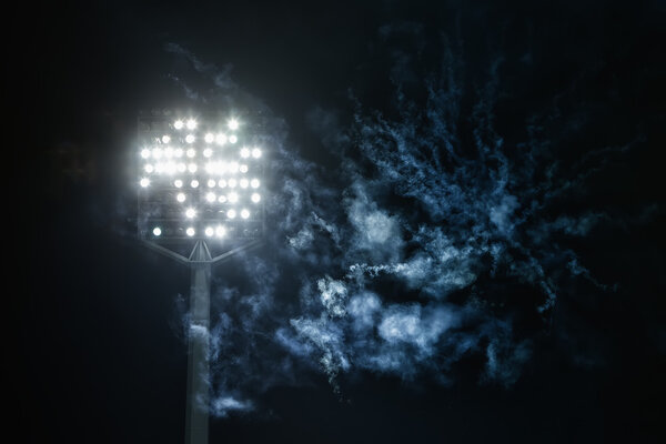 stadium lights and smoke