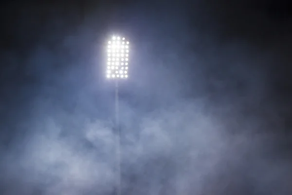 Stadium lights and smoke — Stock Photo, Image