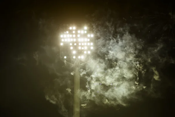 Stadium lights and smoke — Stock Photo, Image