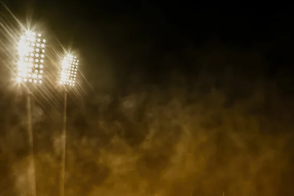 Stadium osvětlení a kouř — Stock fotografie