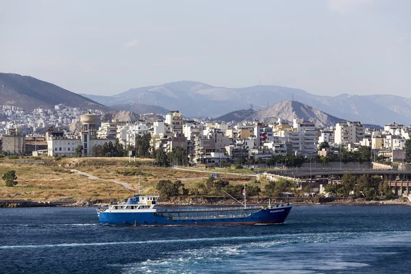 Ferry boats, cruise ships docking at the port of Piraeus, Greece