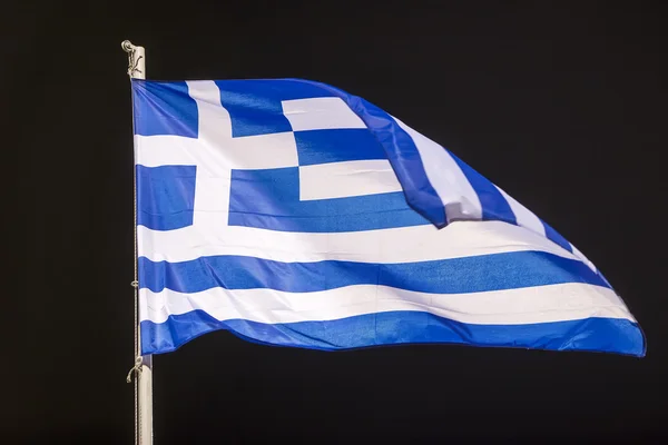 Waving flag of Greece on black background — Stock Photo, Image
