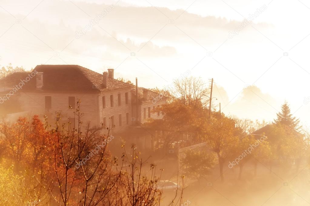 autumn scenery up early with fog in Zagorochoria, Epirus Greece 