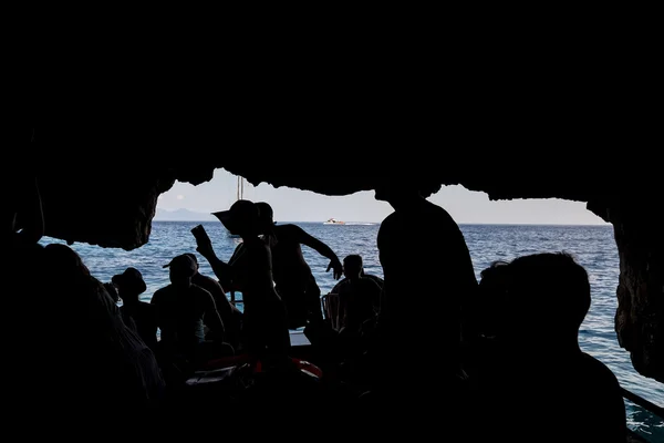 Tourists visiting the Blue caves on Zakynthos Island in Greece — Stock Photo, Image