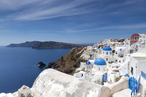 Blue domed churches on the Caldera at Oia on the Greek Island of