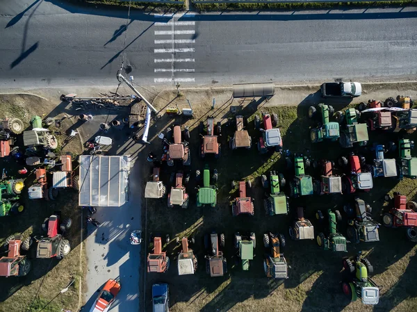 Aerial photographs tractors that have lined up the farmers at th — Stock Photo, Image