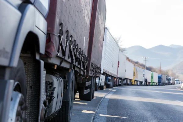 International transport trucks are blocked  from the border cros — Stock Photo, Image