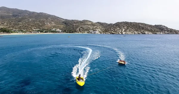 Tourists having fun on inflatable watercraft boat at the beautif — Stock Photo, Image