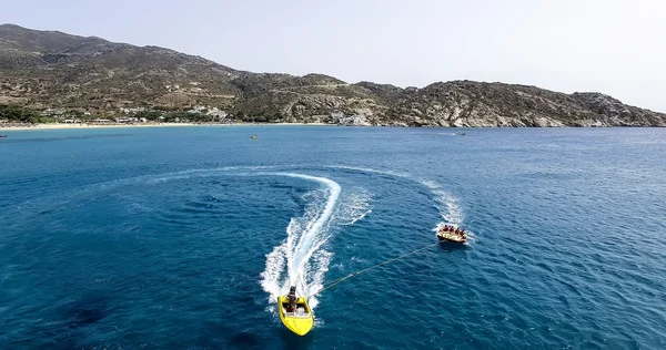 Tourists having fun on inflatable watercraft boat at the beautif — Stock Photo, Image