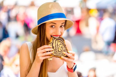 Woman eating traditional slovenian dessert