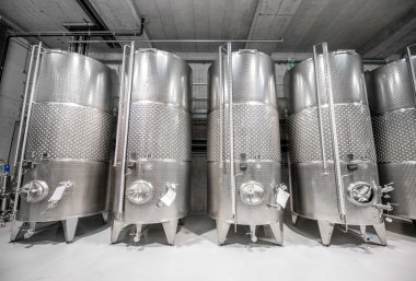 Metal tanks for wine fermentation clipart