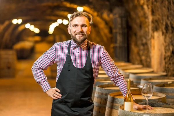 Portrait of a sommelier in the wine cellar — Stock Photo, Image