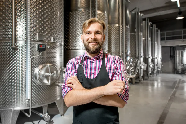 Wine maker at the manufacture — Stock Photo, Image