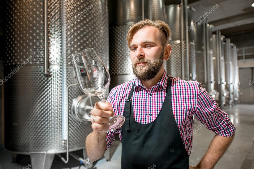 Wine maker at the manufacture — Stock Photo © rossandhelen 120355160