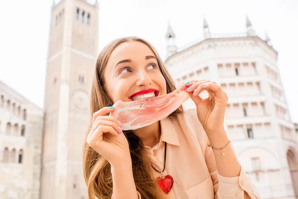 Woman with prosciutto in Parma — Stock Photo, Image