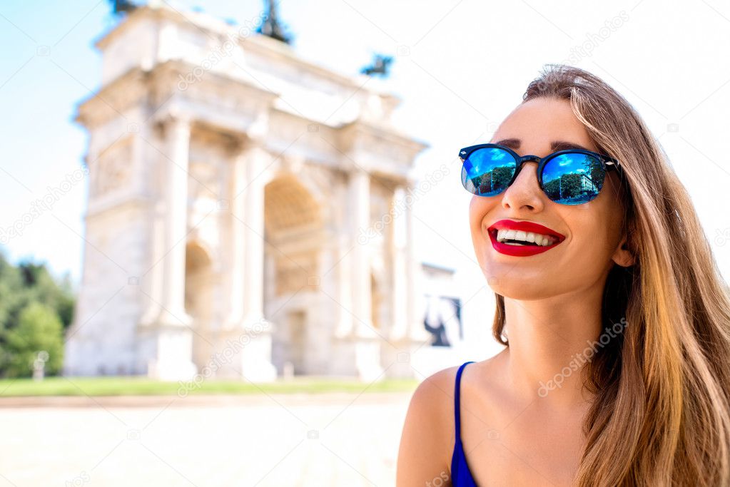 Woman near triumphal arch in Milan