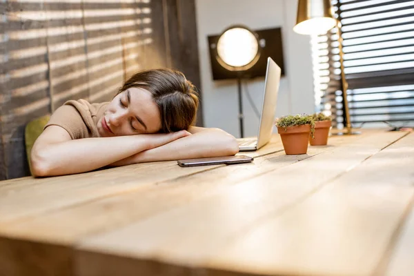 Sleepy woman at the workplace at home — Stock Photo, Image