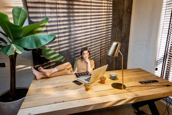 Creative woman with a digital tablet at home office — Stock Photo, Image