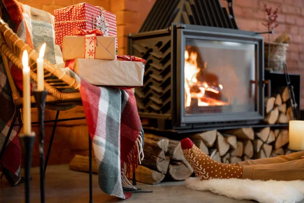 Burning fireplace at home during winter holidays