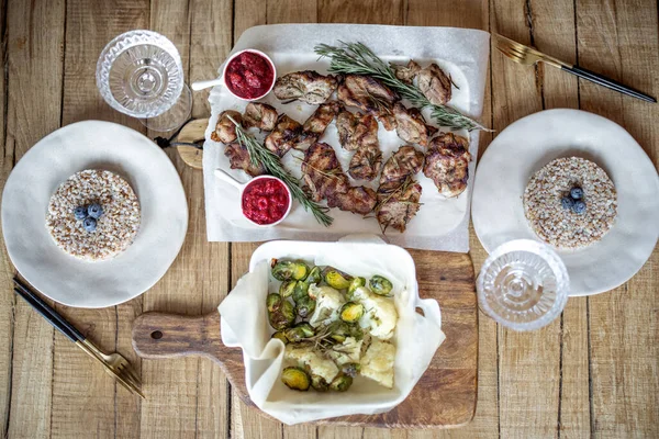 Serving lunch on a wooden table — Stock Photo, Image