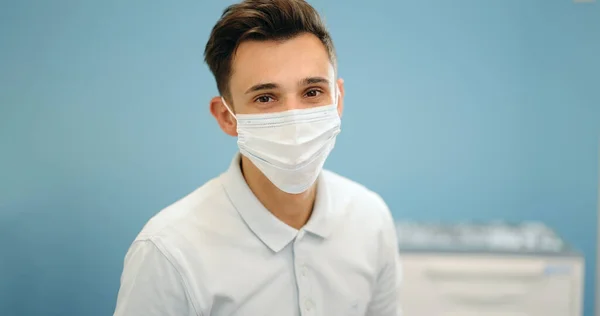 Portrait of a young smiling dentist at the dental office — Stock Photo, Image