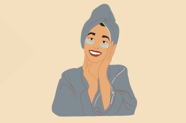 Hidrojeli anti-yaş göz bantları olan güzel bir kadın. 