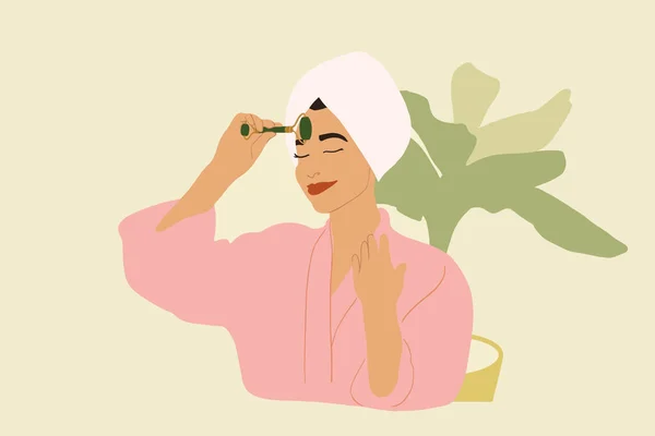 Mujer en albornoz rosa con rodillo de masaje facial — Vector de stock