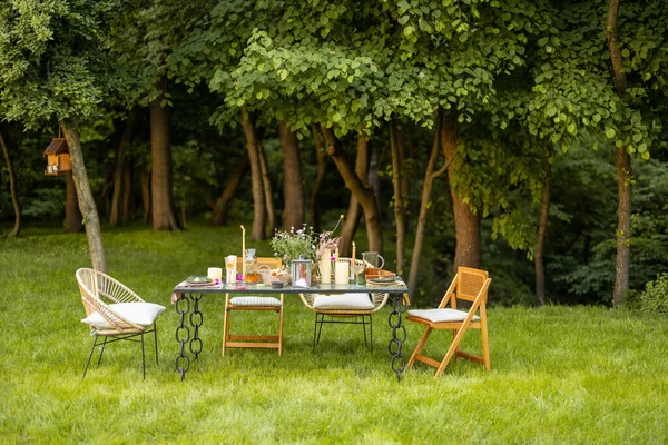 Beautifully decorated dining table on nature