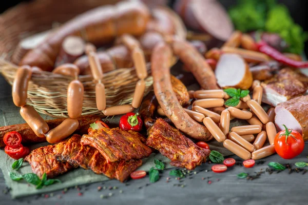 Assortment of meat and sausages — Stock Photo, Image