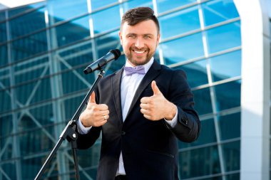 Portrait of well-dressed man on the contempopary background clipart
