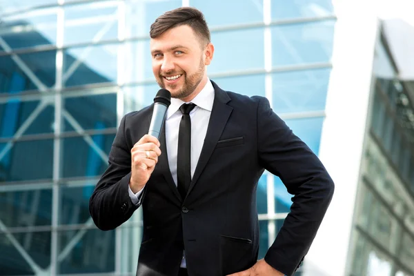 Portrait of well-dressed man on the contempopary background — Stock Photo, Image
