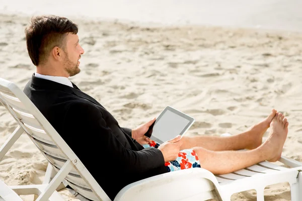 Businessman on the beach