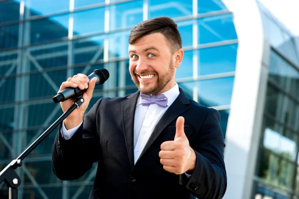 Portrait of well-dressed man on the contempopary background Stock Image